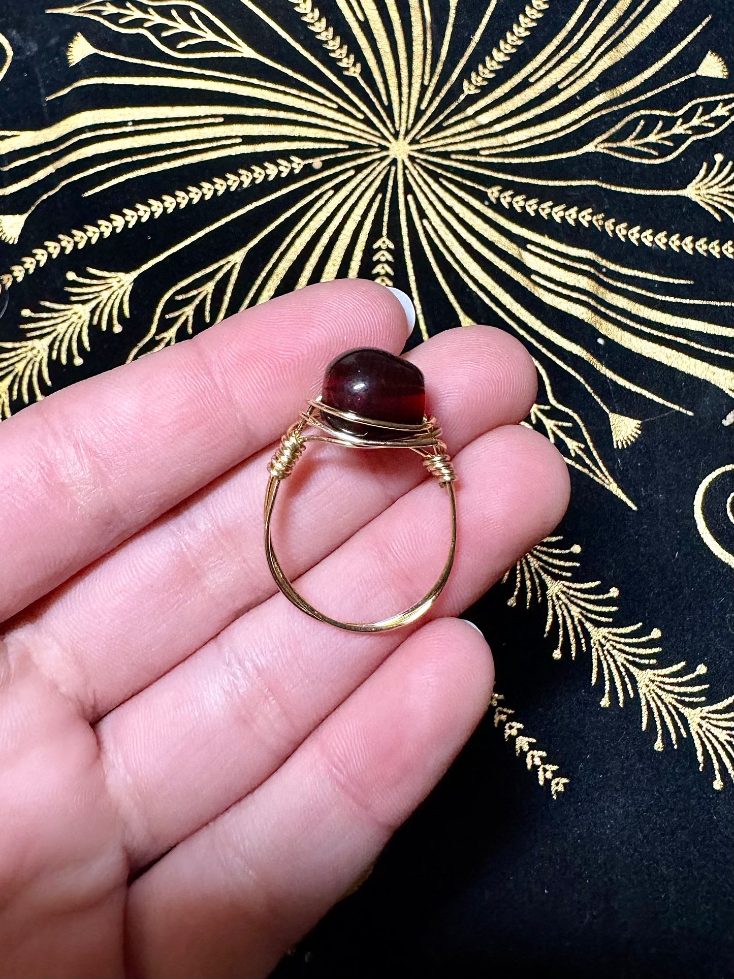 Dark red bead ring