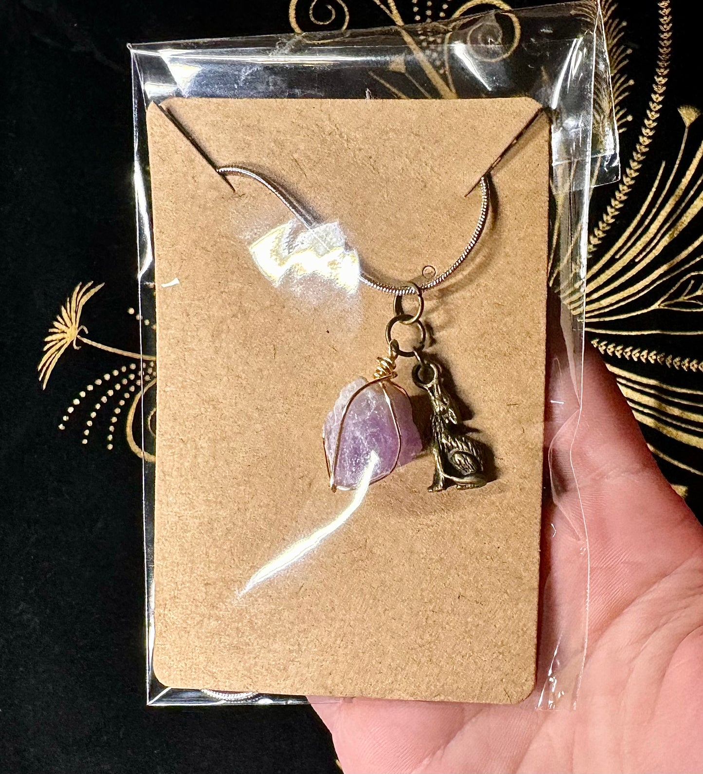 Amethyst and wolf necklace