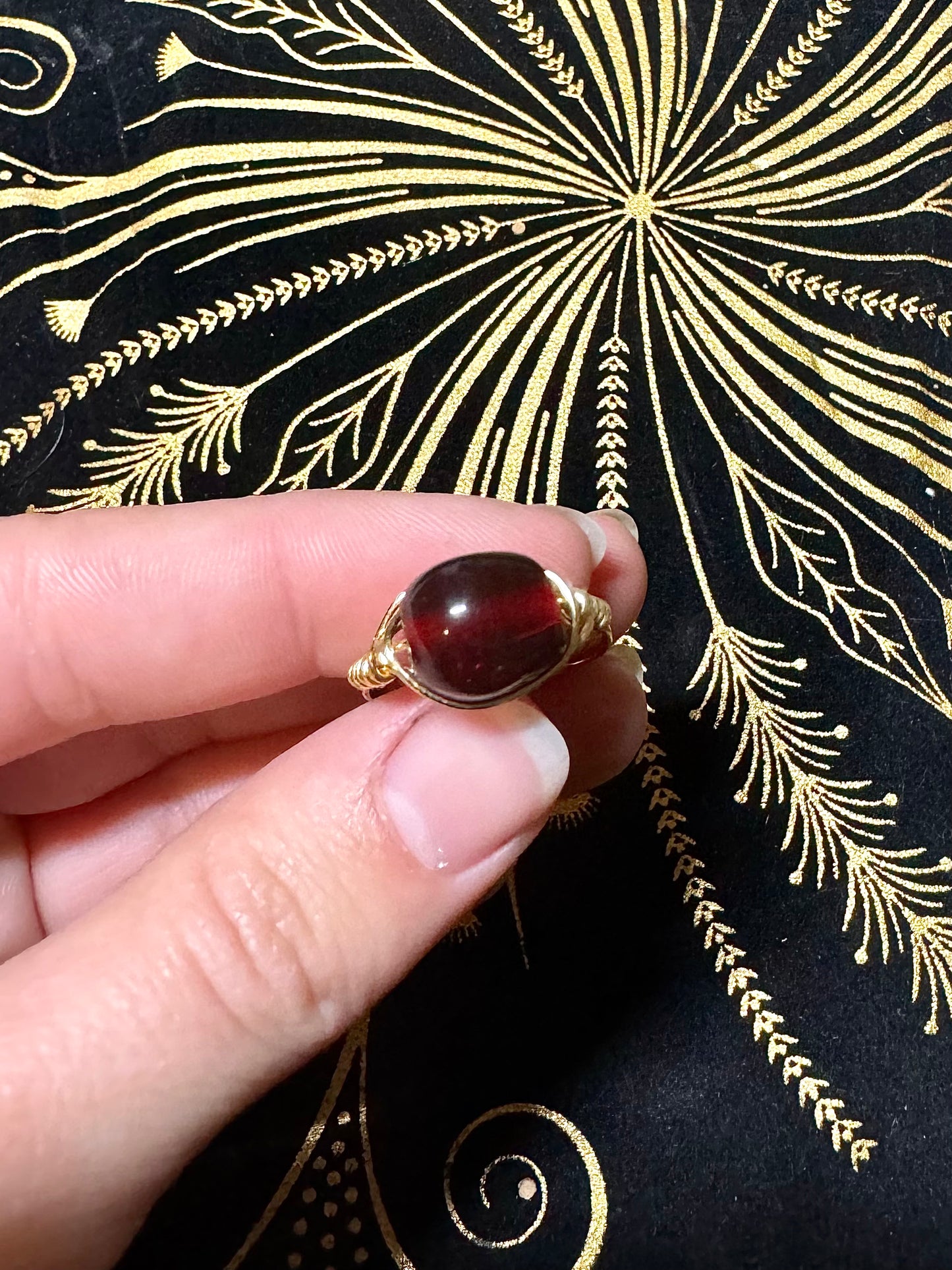 Dark red bead ring